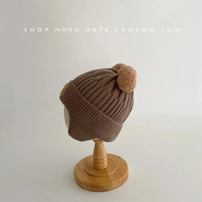 Baby Bear Earflap Beanie — Cozy Winter Hat That Keeps Tiny Ears Warm & Adorably Covered