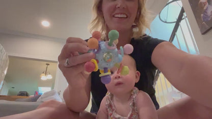 Baby Sensory Rattle Ball Teether — 360° Rotating Chew Toy That Keeps Little Hands Busy & Gums Happier
